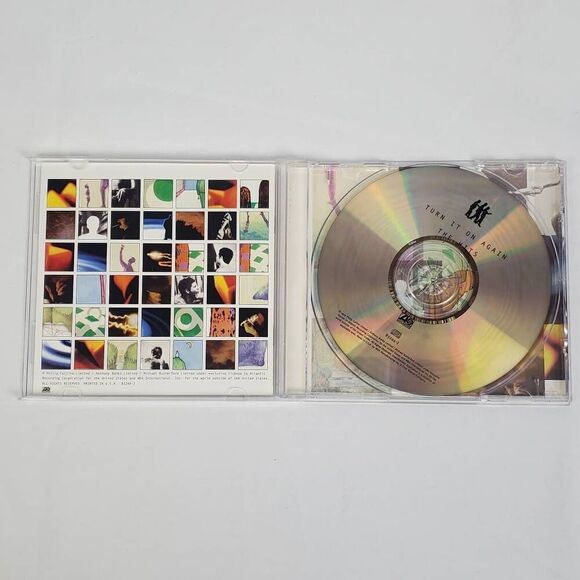 Genesis – Turn It On Again: The Hits (CD, 1999) Greatest Hits Collection - Picture 2 of 3